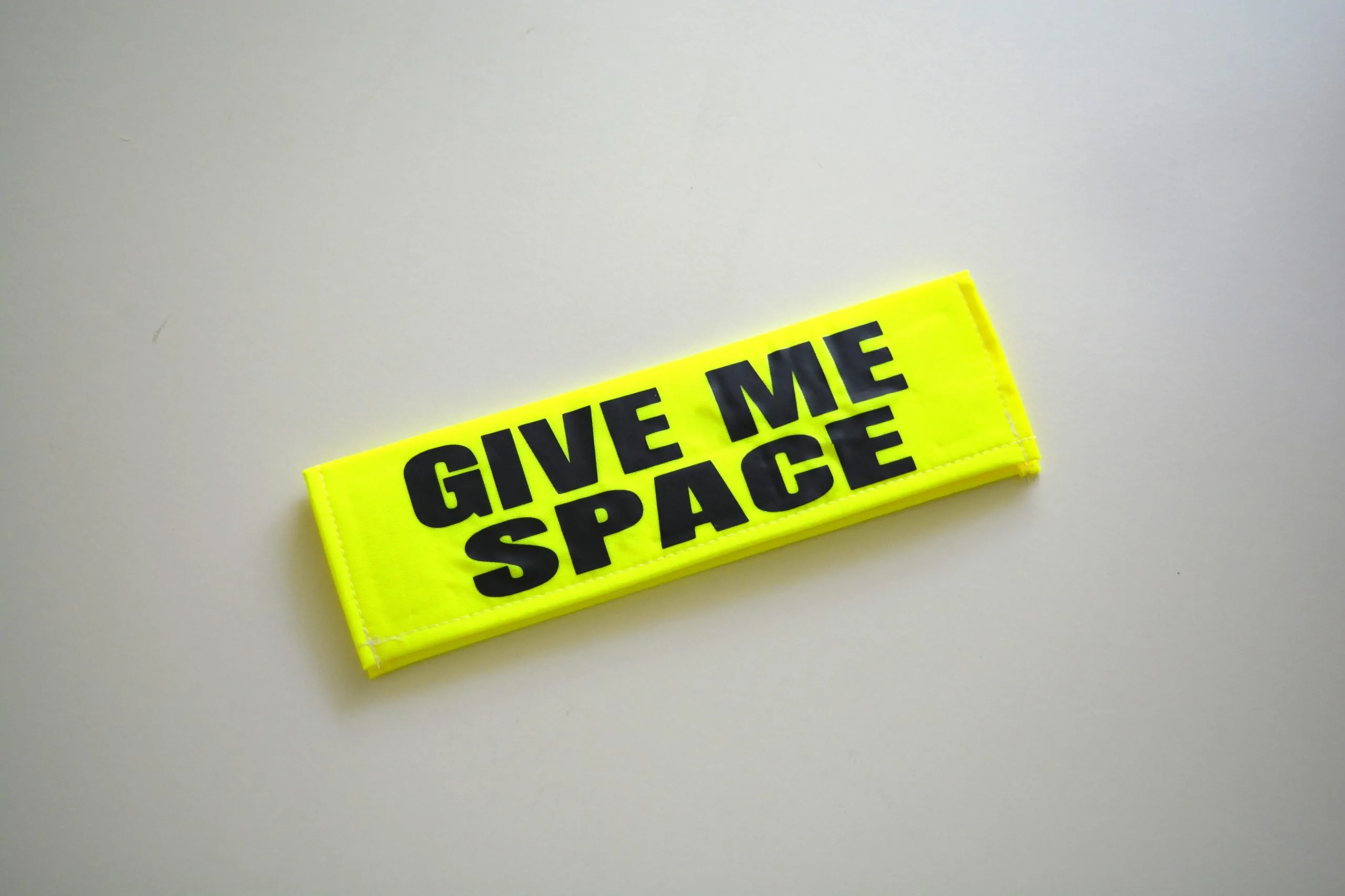 High Visible yellow leash sleeve with black bold "GIVE ME SPACE" Text