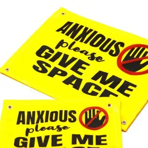 Yellow dog crate sign with bold black text reading “Please Give Me Space,” featuring a “Do Not Touch” symbol